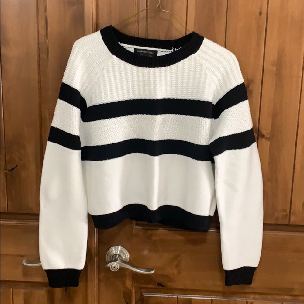 White and black sweater